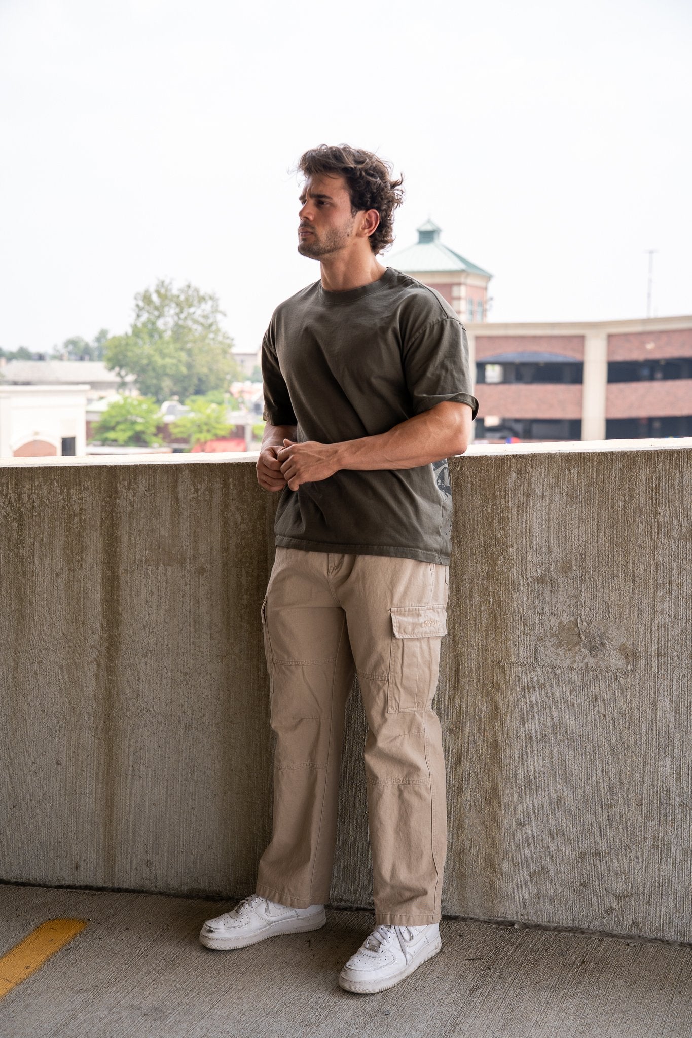Army Green Detroit Renaissance Heavyweight Tee, on model, three-quarter view