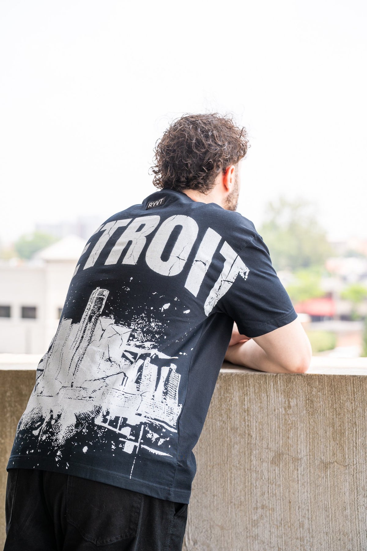 Black Detroit Renaissance Heavyweight Tee, on model, rear view