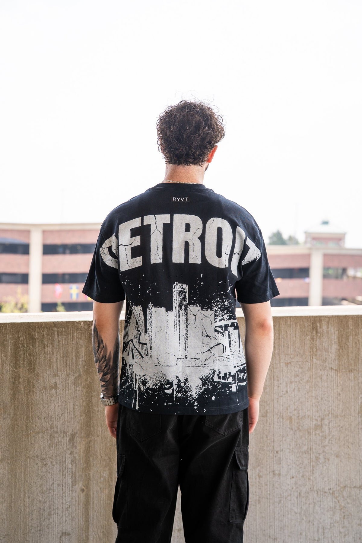 Black Detroit Renaissance Heavyweight Tee, on model, rear view