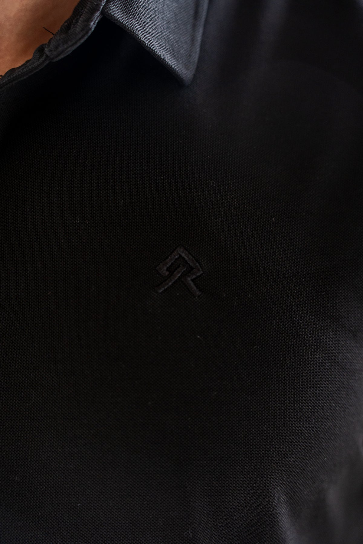 Black Executive Polo, on model, detail view
