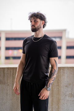 Black Foundation Tee, on model, front view