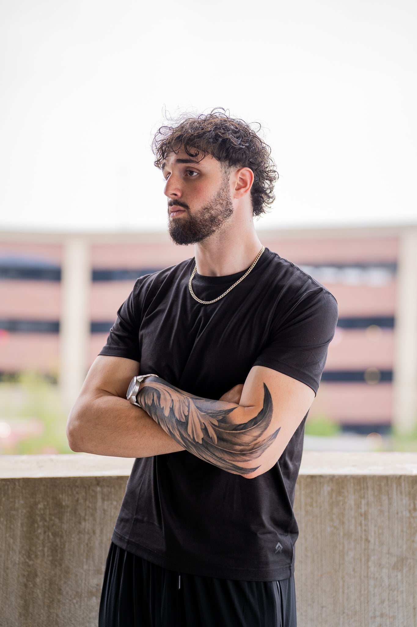 Black Foundation Tee, on model, three-quarter view