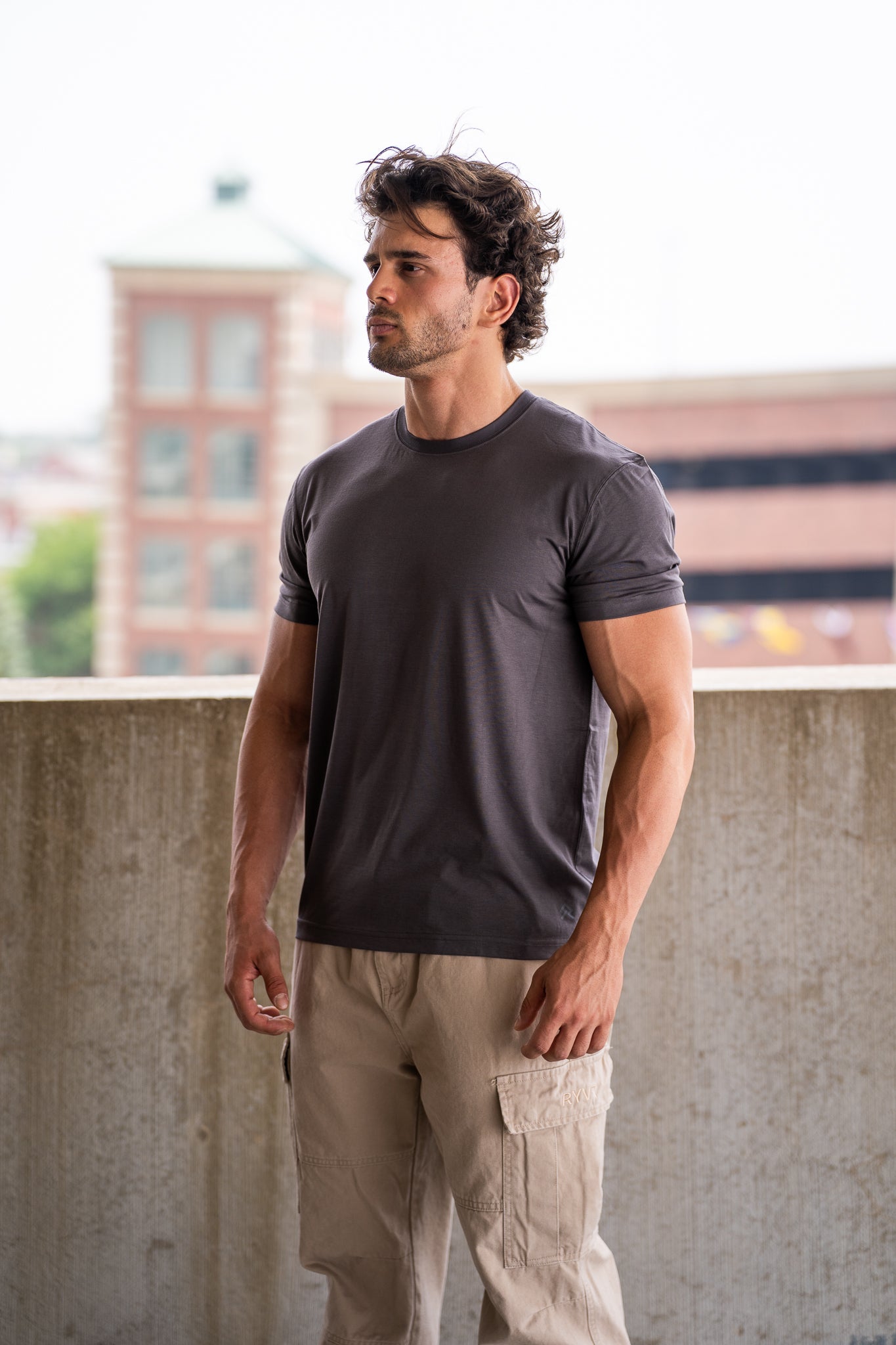 Charcoal Taupe Foundation Tee, on model, three-quarter view