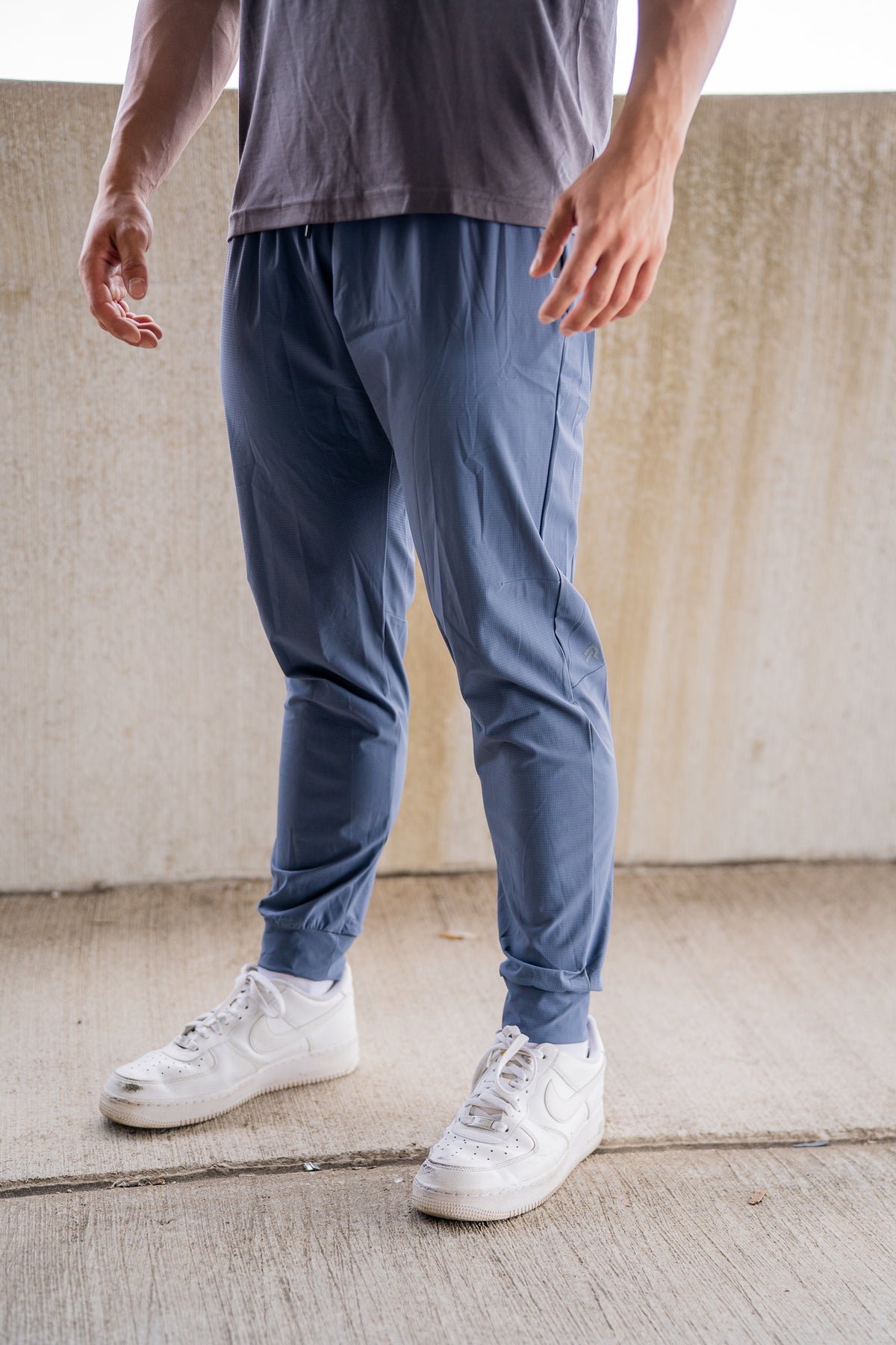 Blue Kinetic Cuffed Joggers, on model, front view