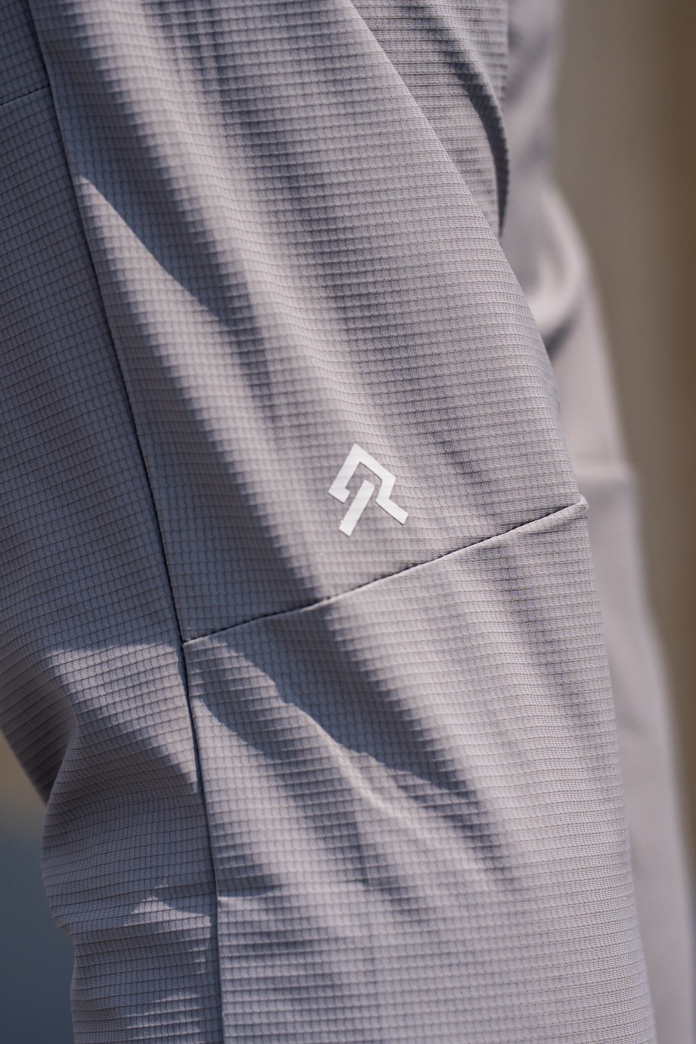 Grey Kinetic Cuffed Joggers, on model, detail view