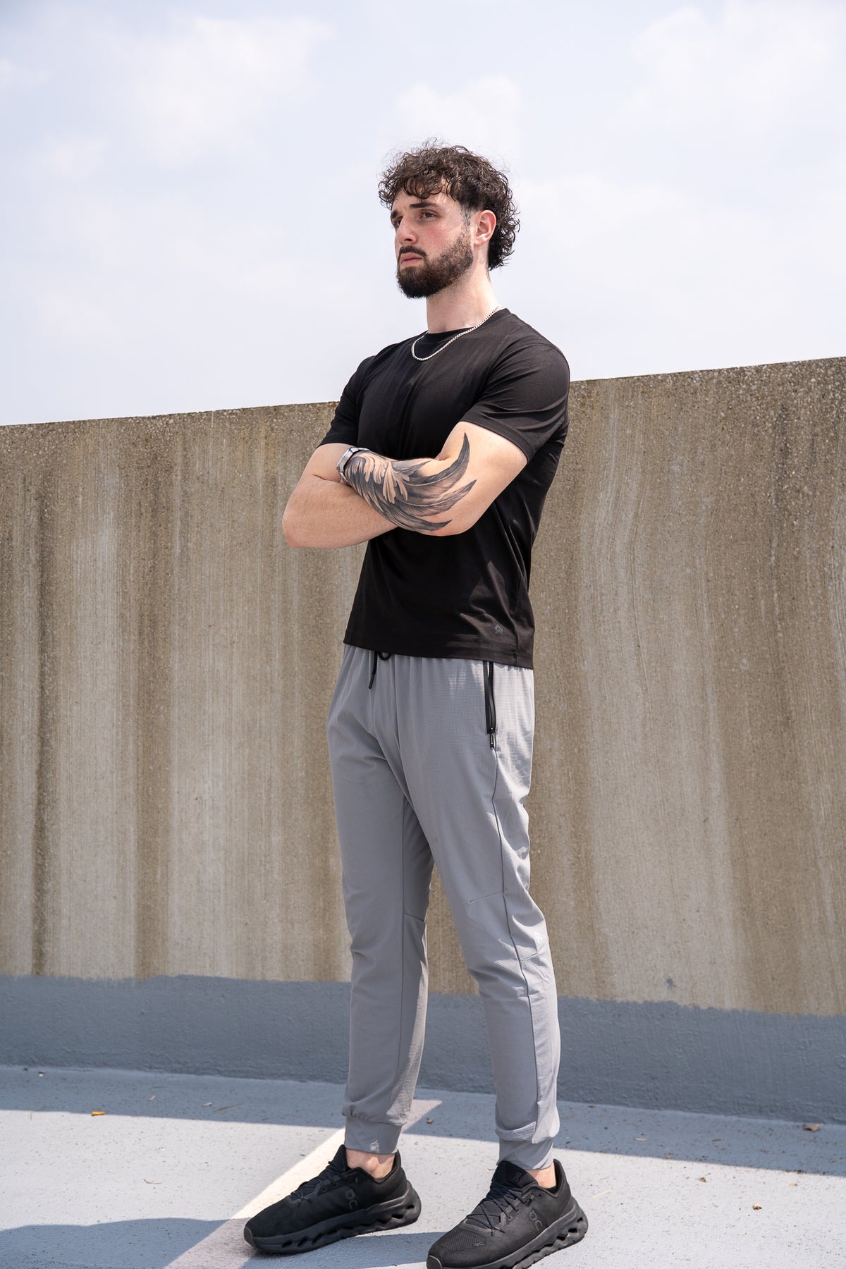 Grey Kinetic Cuffed Joggers, on model, three-quarter view